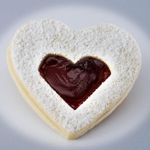 linzer shortbread heart with raspberry jam